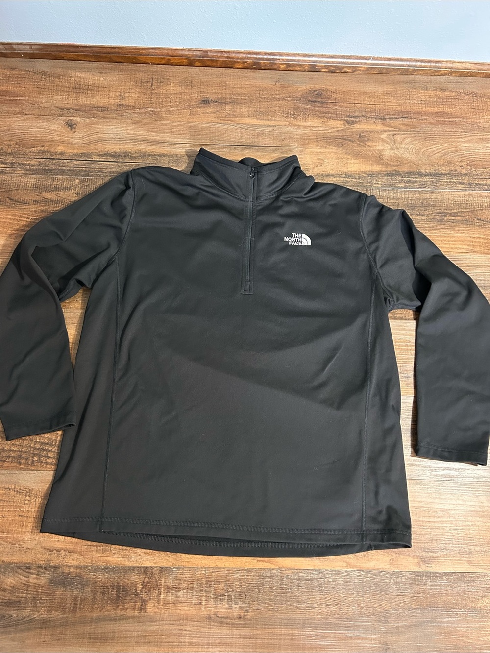 The North Face Men’s Black Quarter-Zip Pullover sweatshirt